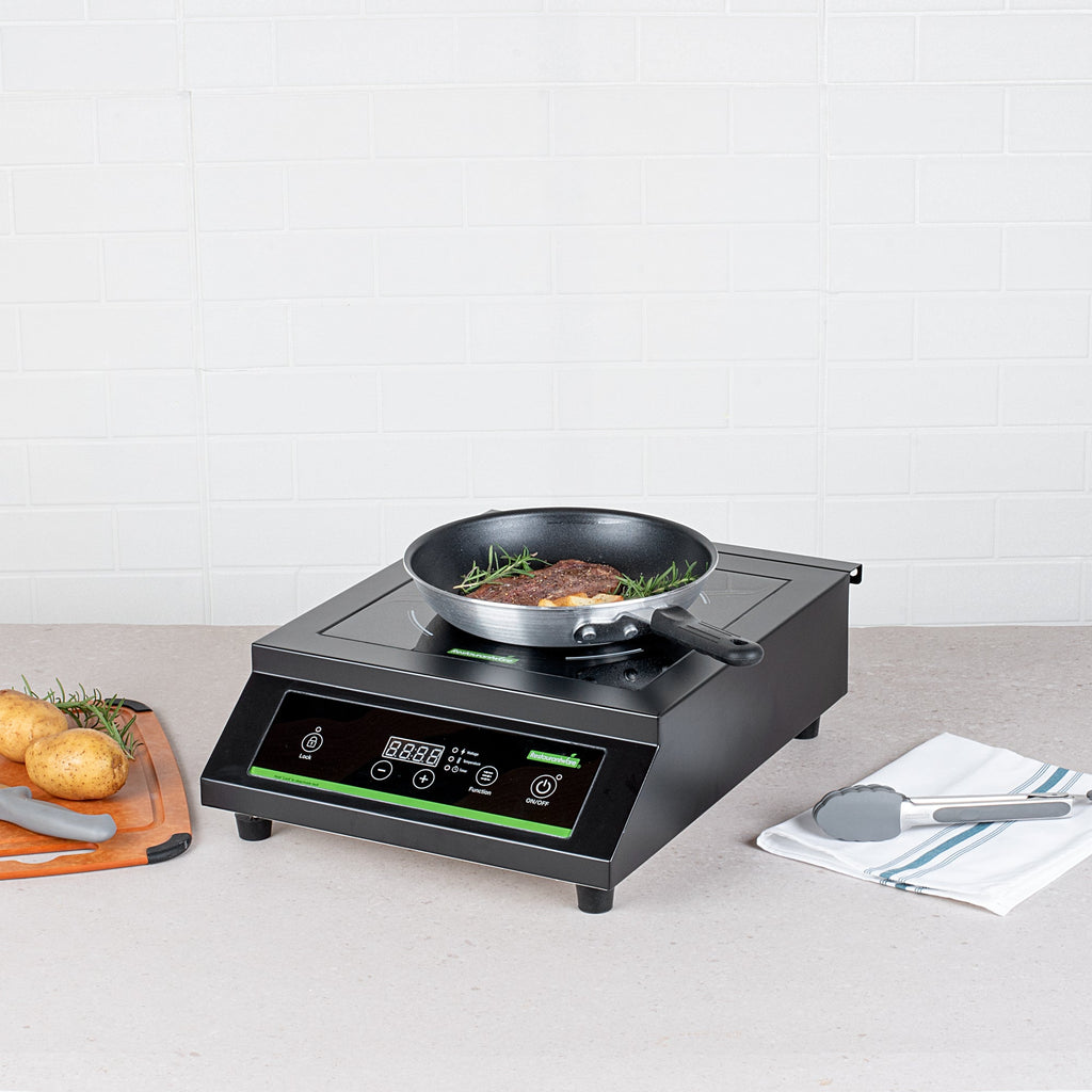 Kitchen Tek Black Steel Heavy-Duty Induction Cooktop - 240V, 3500 Watts - 20" x 15" x 5 3/4" - 1 count box