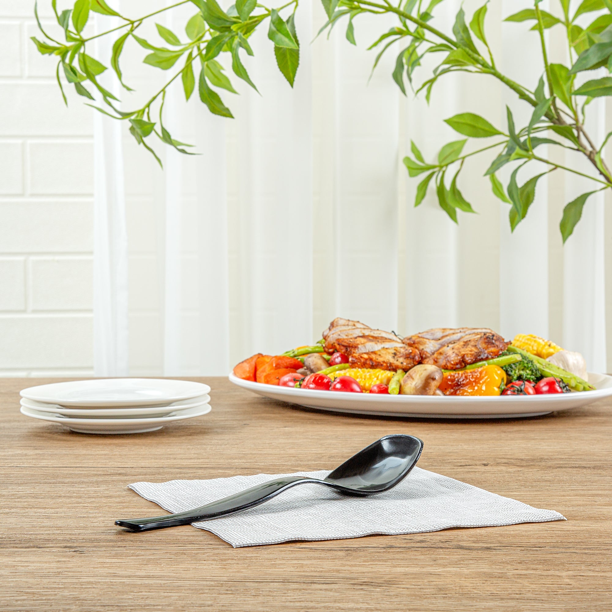 Cater Tek Black Plastic Serving Spoon - 8 1/2" - 100 count box