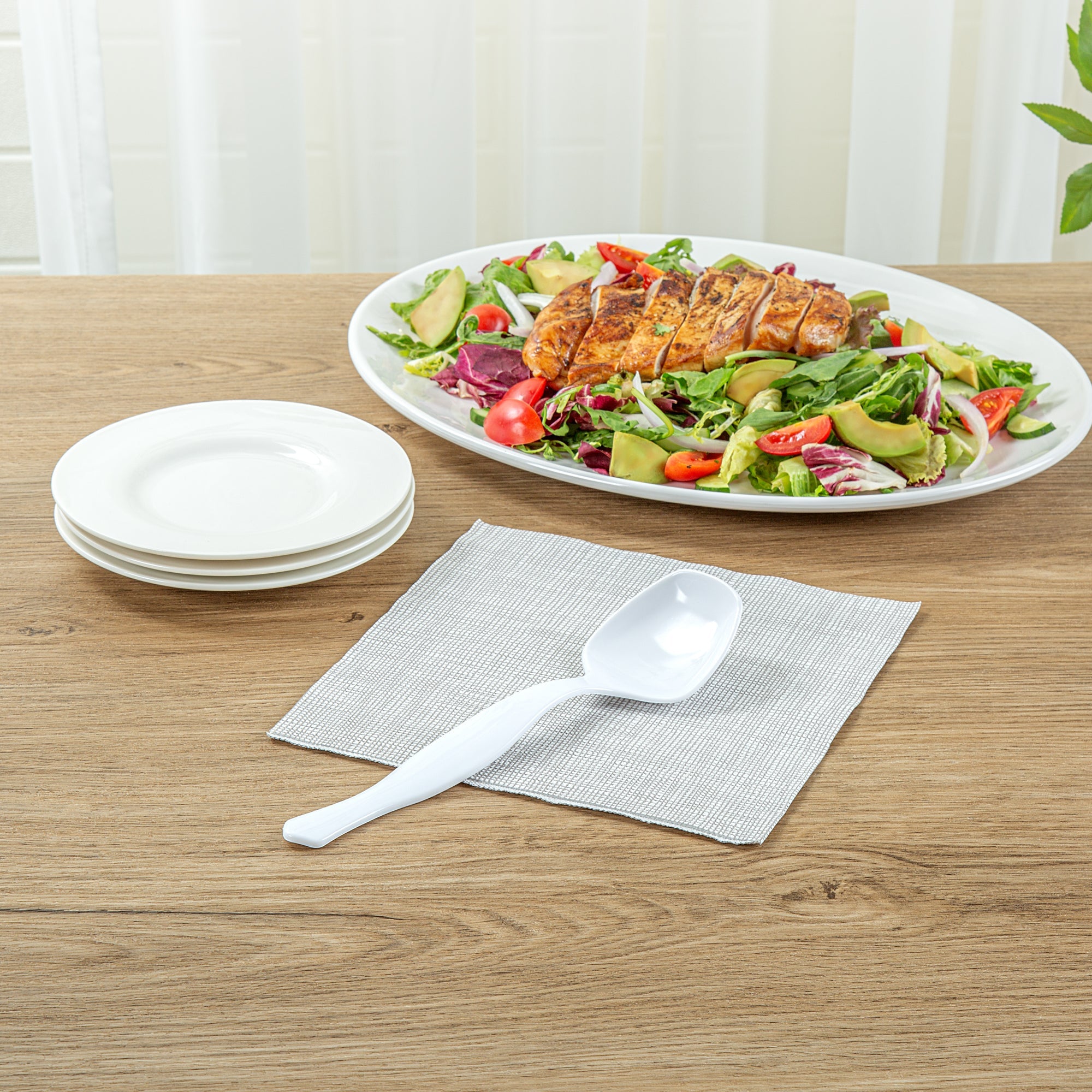 Cater Tek White Plastic Serving Spoon - 8 1/2" - 10 count box