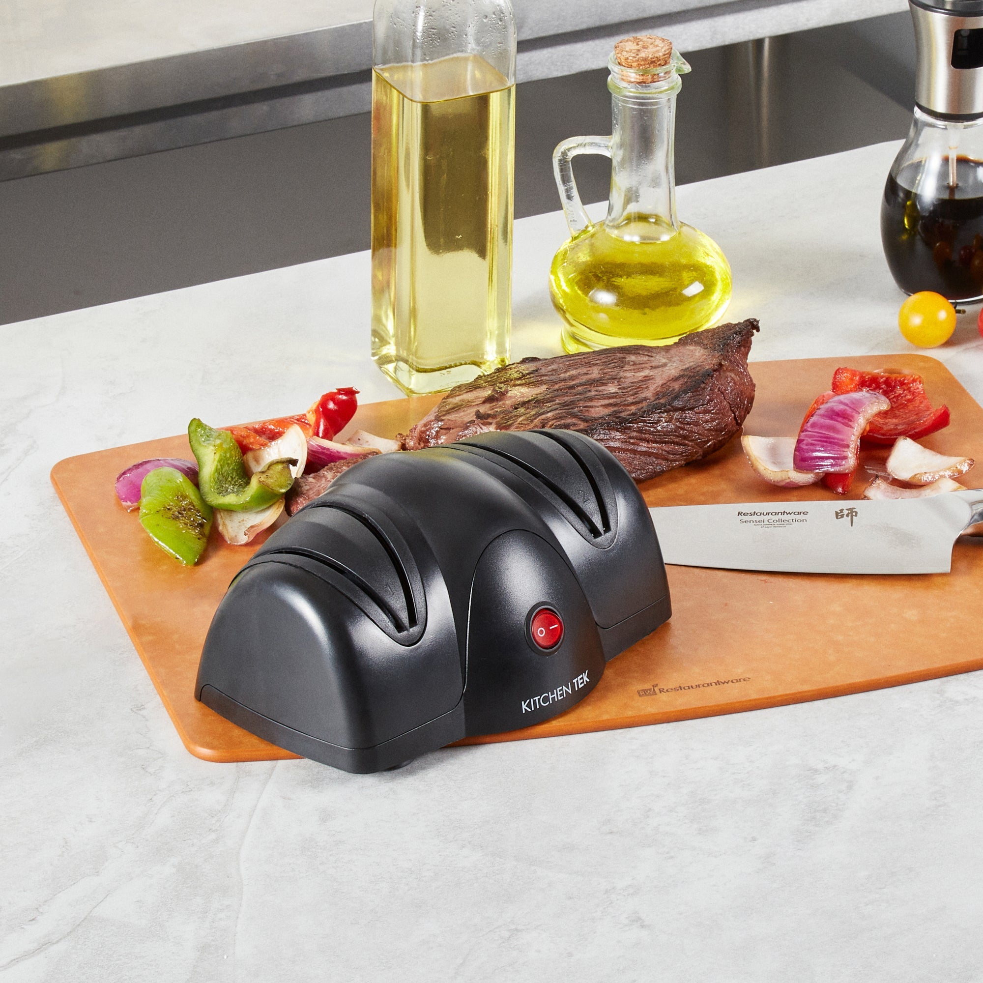 Kitchen Tek Black Plastic 2 Stage Electric Knife Sharpener - for Straight Edge Knives, 120V - 7 1/2'' x 5 3/4'' x 3 3/4'' - 1 count box
