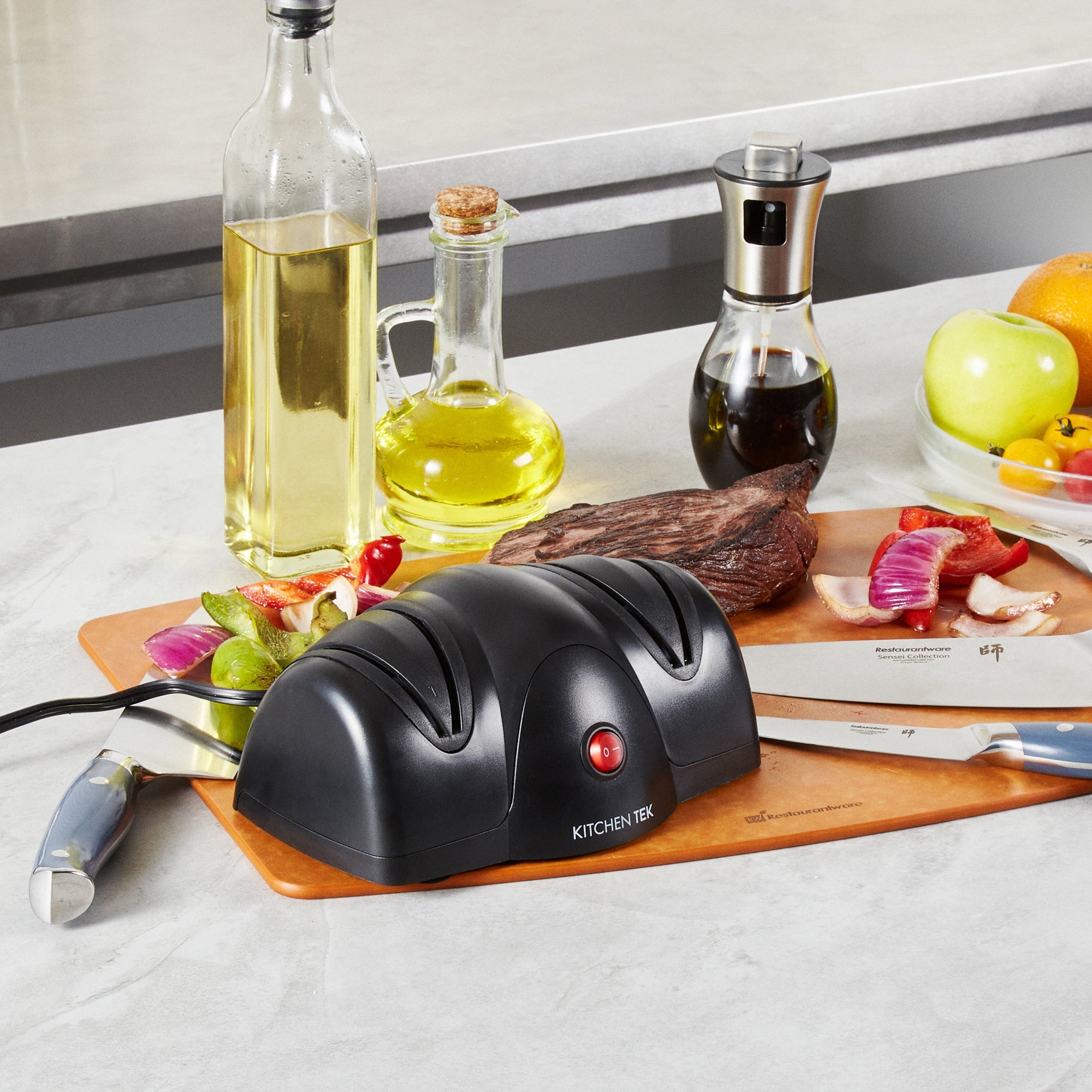 Kitchen Tek Black Plastic 2 Stage Electric Knife Sharpener - for Straight Edge Knives, 120V - 7 1/2'' x 5 3/4'' x 3 3/4'' - 1 count box