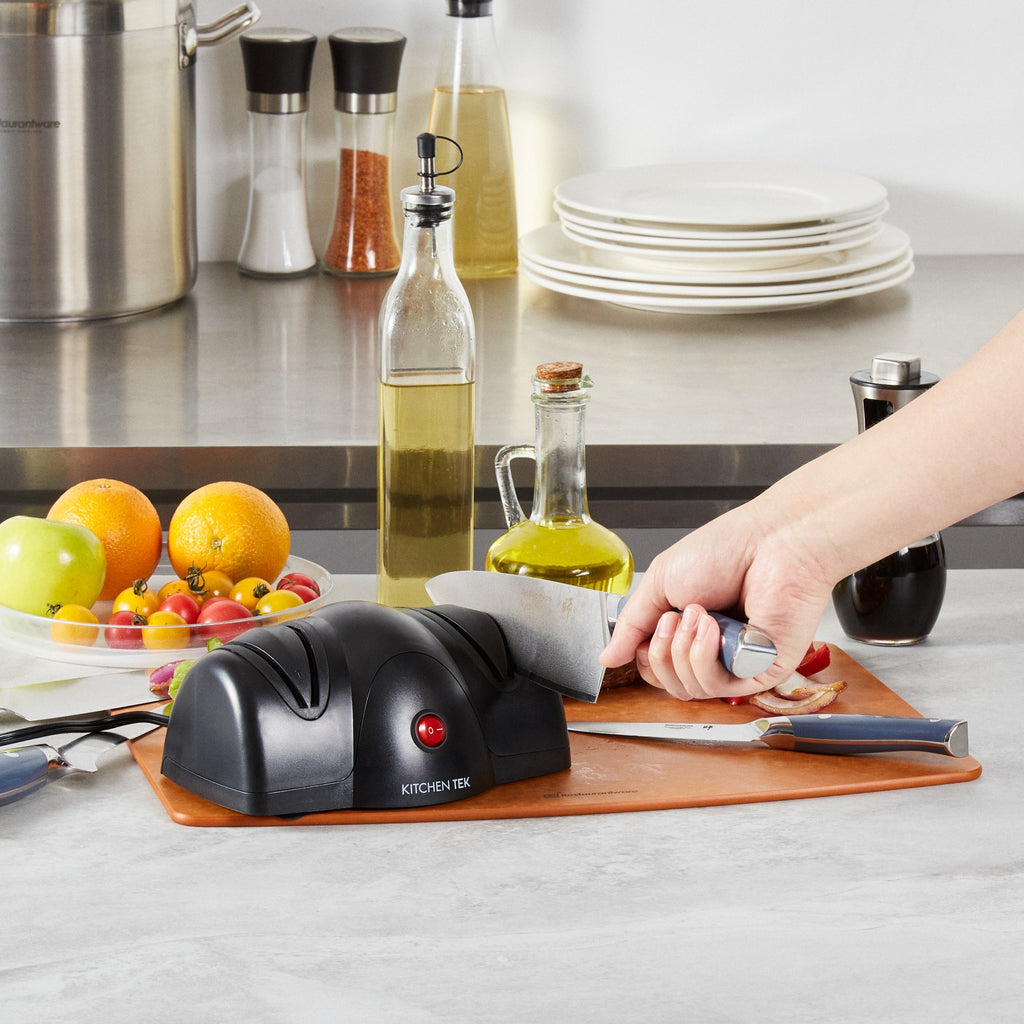 Kitchen Tek Black Plastic 2 Stage Electric Knife Sharpener - for Straight Edge Knives, 120V - 7 1/2'' x 5 3/4'' x 3 3/4'' - 1 count box