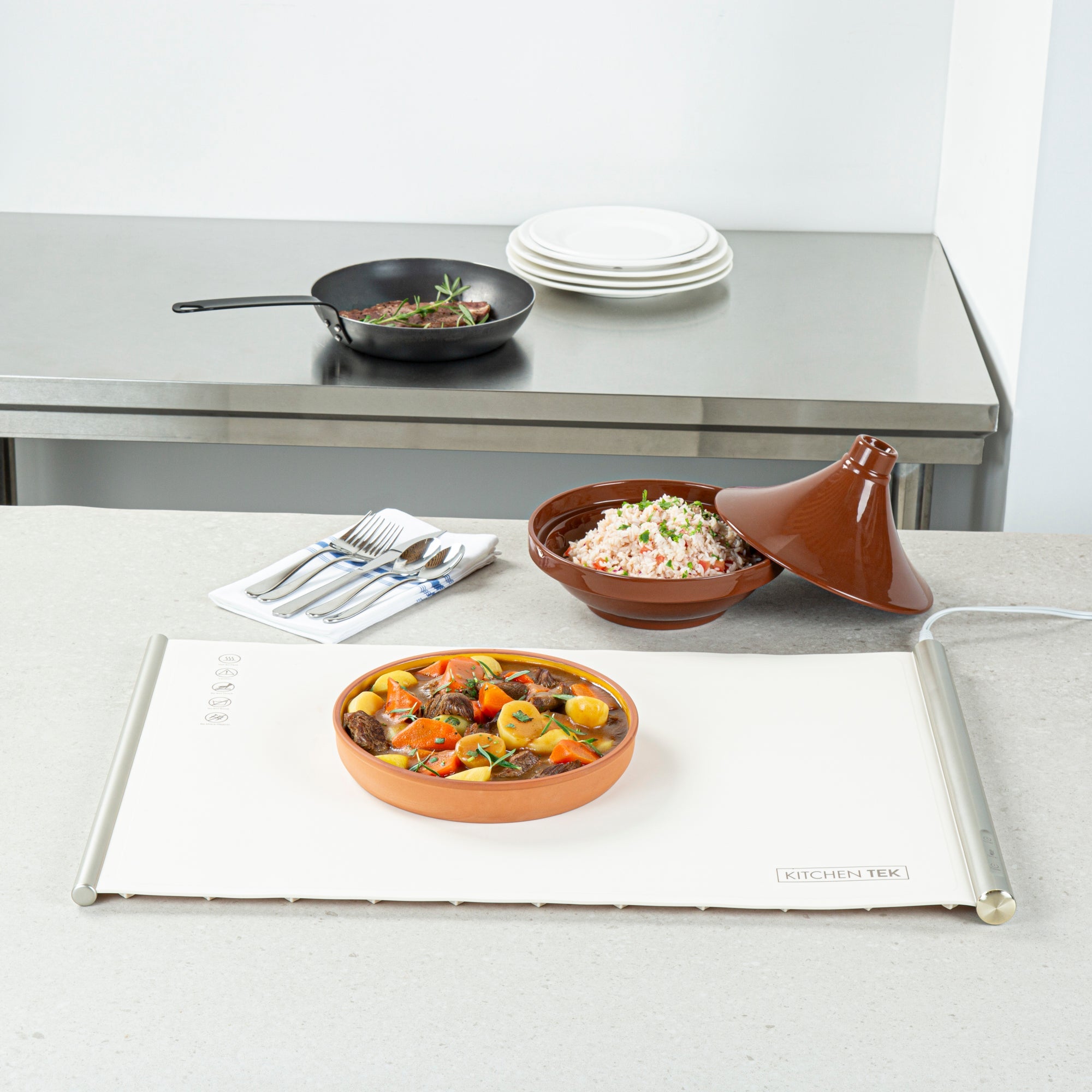 Kitchen Tek Beige Silicone Food Warmer Mat - 120V, Adjustable Temperature, Roll Up - 26 1/4" x 16 3/4" x 1" - 1 count box