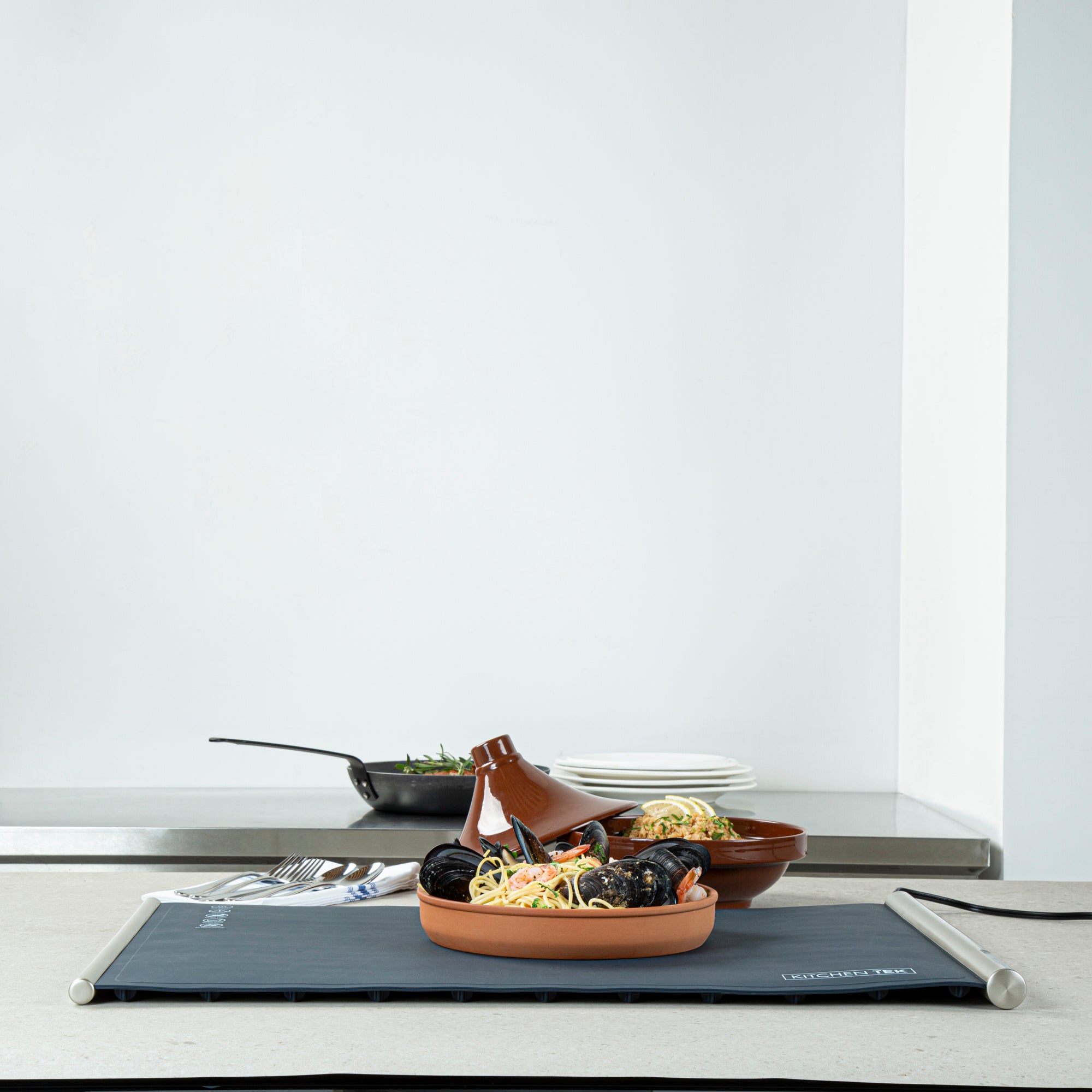 Kitchen Tek Dark Blue Silicone Food Warmer Mat - 120V, Adjustable Temperature, Roll Up - 26 1/4" x 16 3/4" x 1" - 1 count box