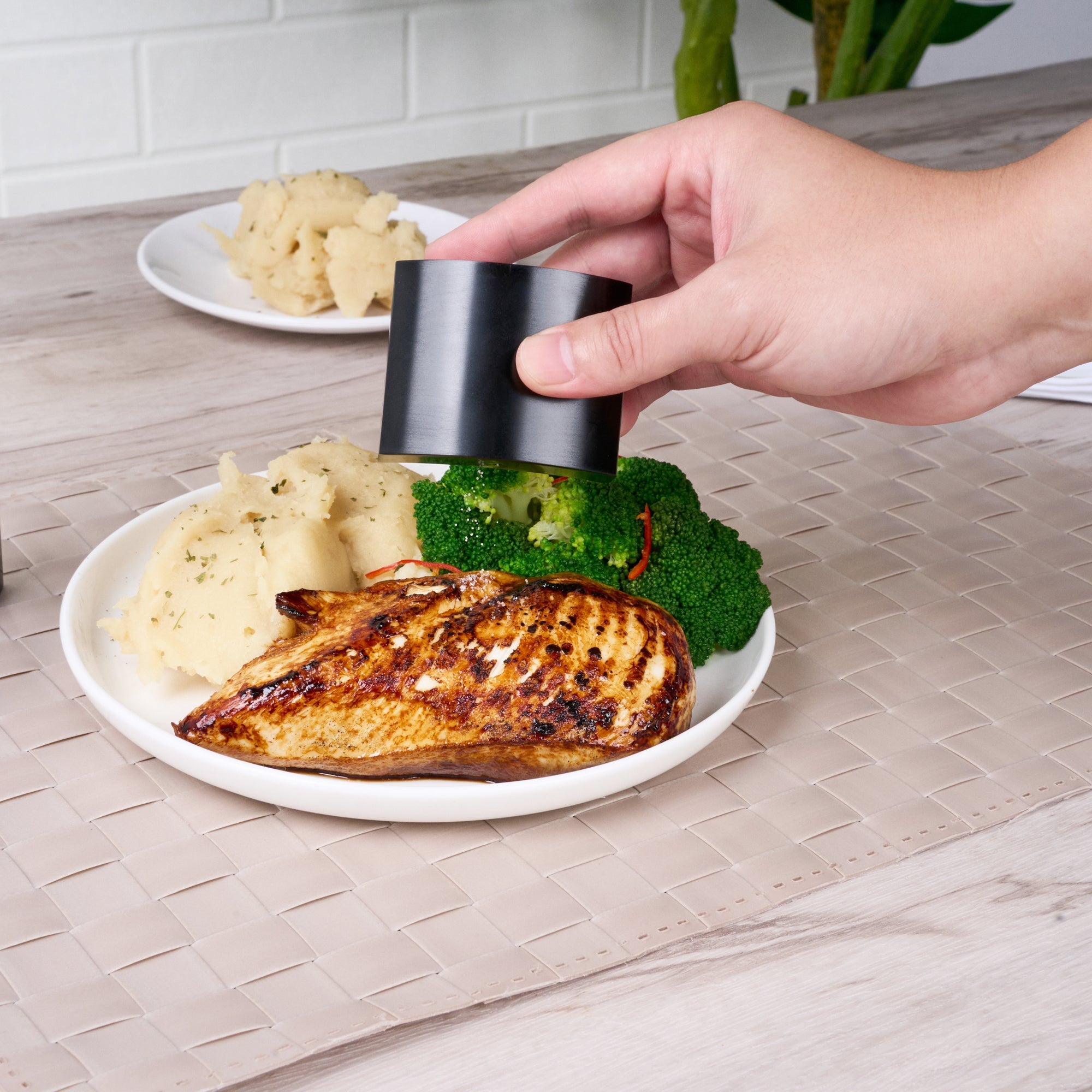 Chef 101 4 oz Black Stainless Steel Embracing Salt And Pepper Shaker Set - 2.3 oz/2.1 oz - 2 1/2" x 2" x 1 3/4" - 1 count box
