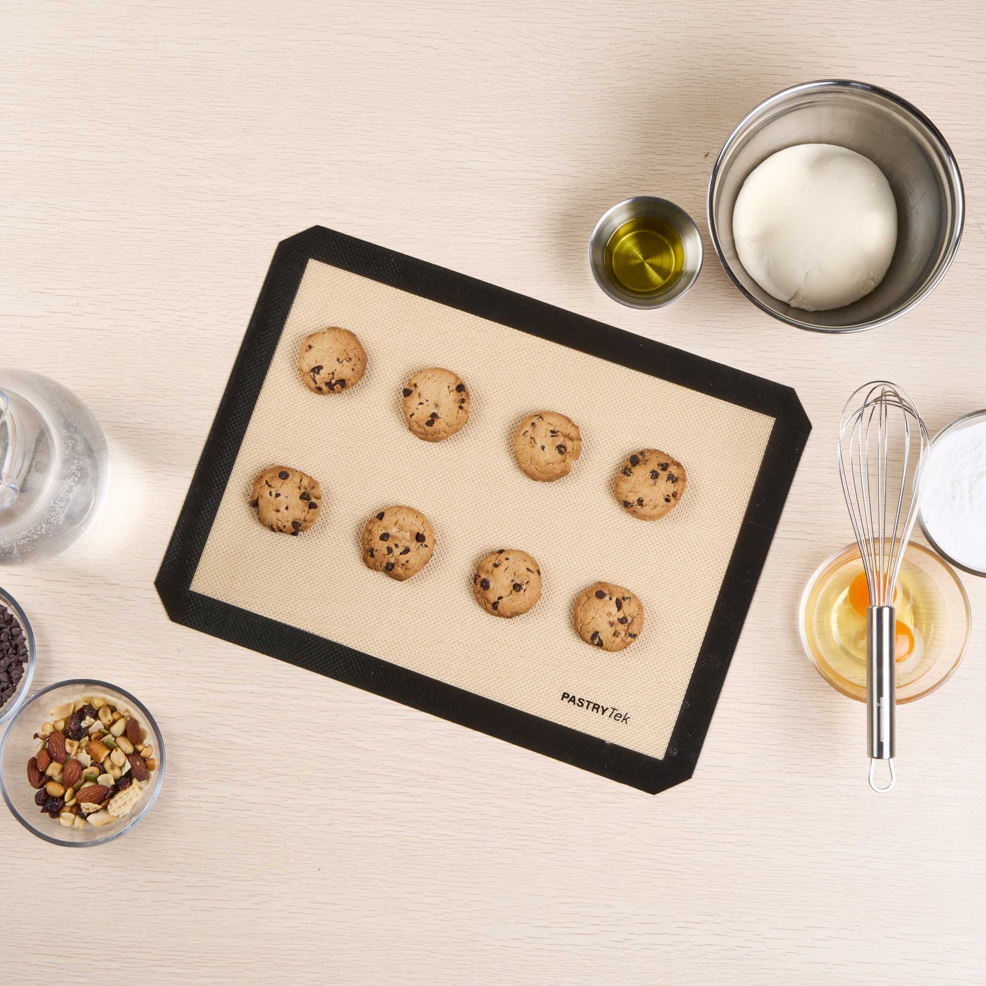 Pastry Tek Rectangle Tan and Black Silicone Half Size Baking Mat - Ultra Durable - 11 3/4" x 15 3/4" - 1 count box