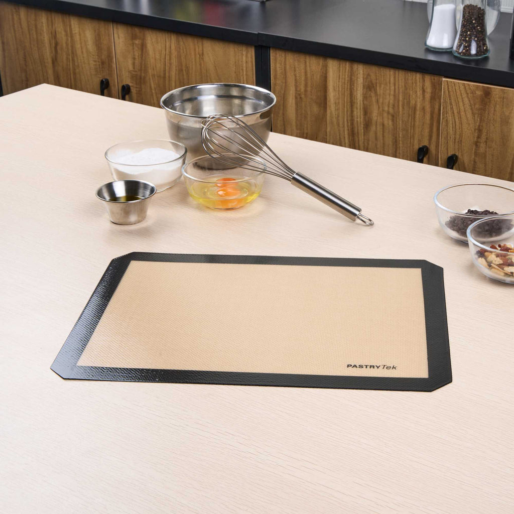 Pastry Tek Rectangle Tan and Black Silicone Half Size Baking Mat - Ultra Durable - 11 3/4" x 15 3/4" - 1 count box