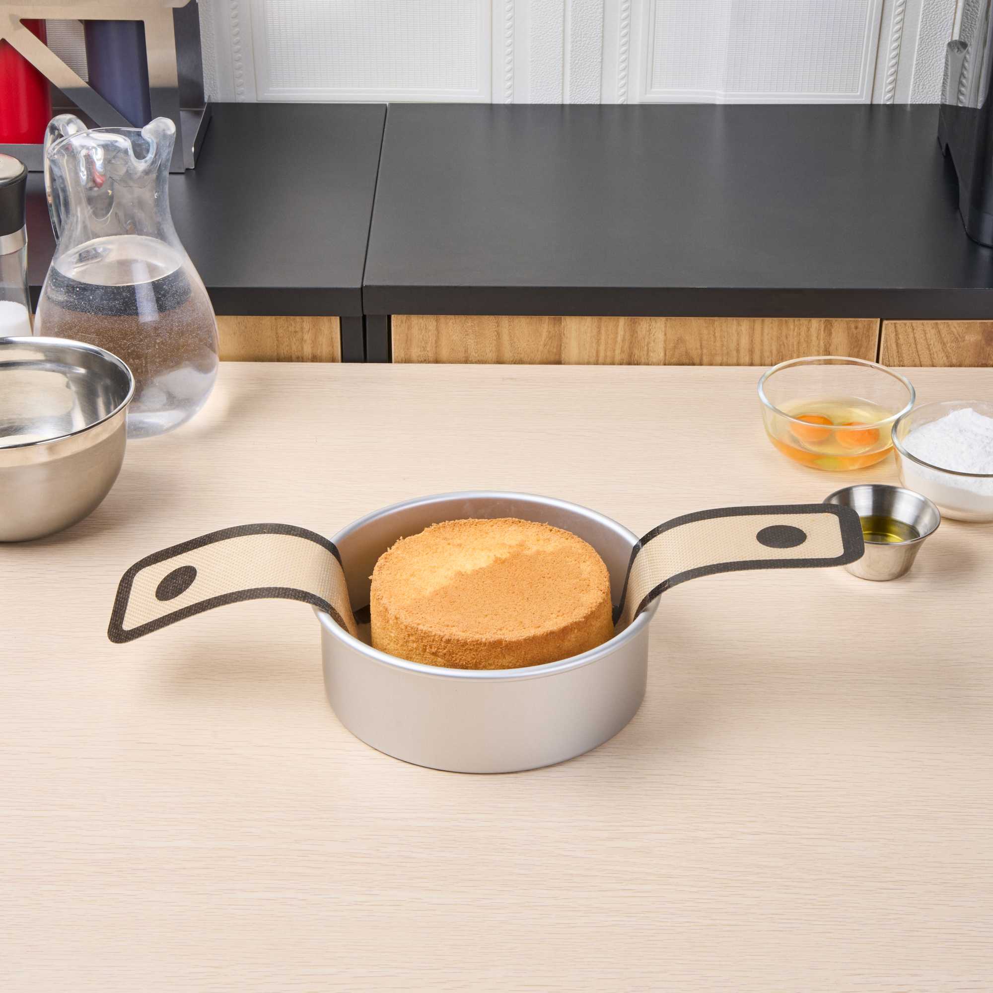 Pastry Tek Round Tan and Black Fiberglass Bread Sling - For Dutch Oven, with Long Handles - 22 3/4" x 8 1/4" - 1 count box