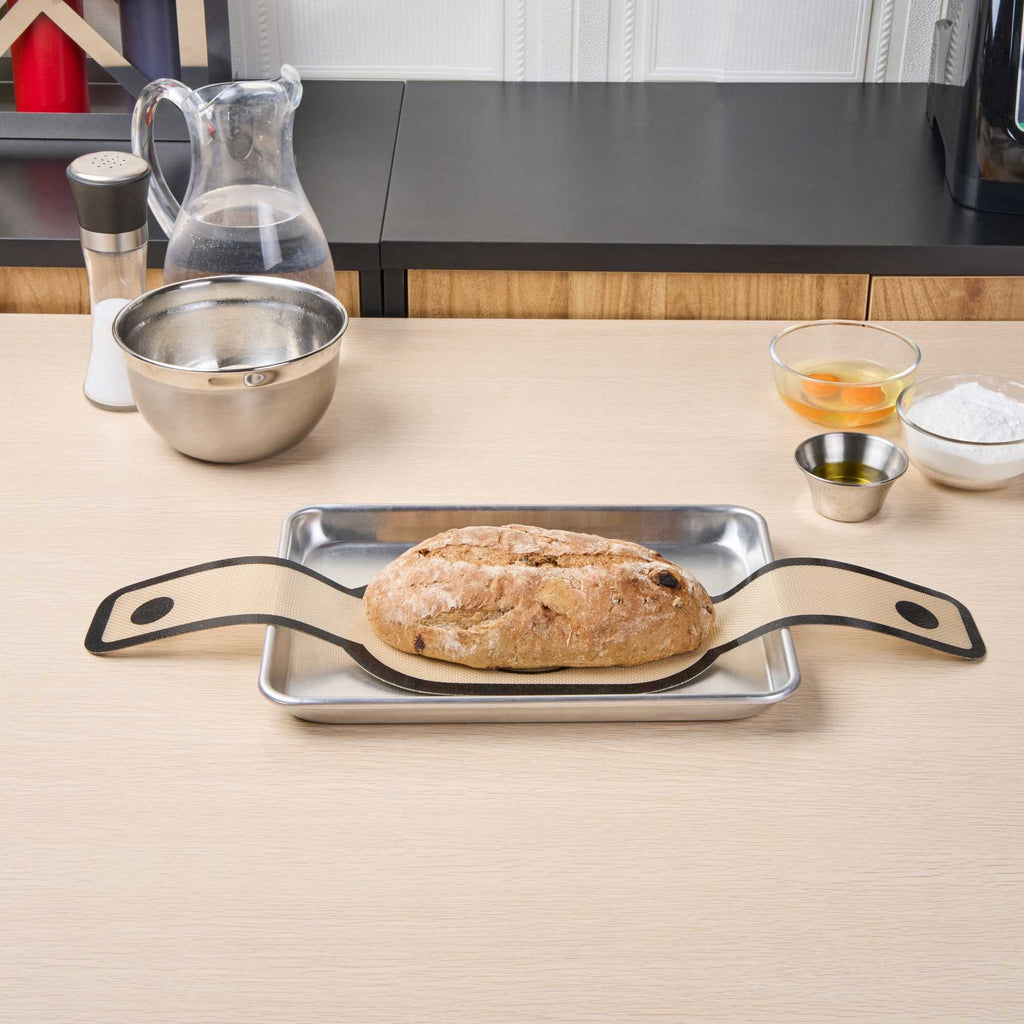 Pastry Tek Oval Tan and Black Fiberglass Bread Sling - For Dutch Oven, with Long Handles - 23 1/2" x 6" - 1 count box