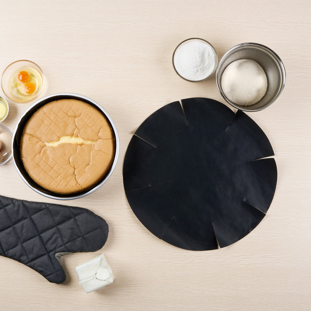 Pastry Tek Round Black Fiberglass Cake Tin Liner - Non-Stick, Foldable - 9 1/2" x 9 1/2" - 5 count box