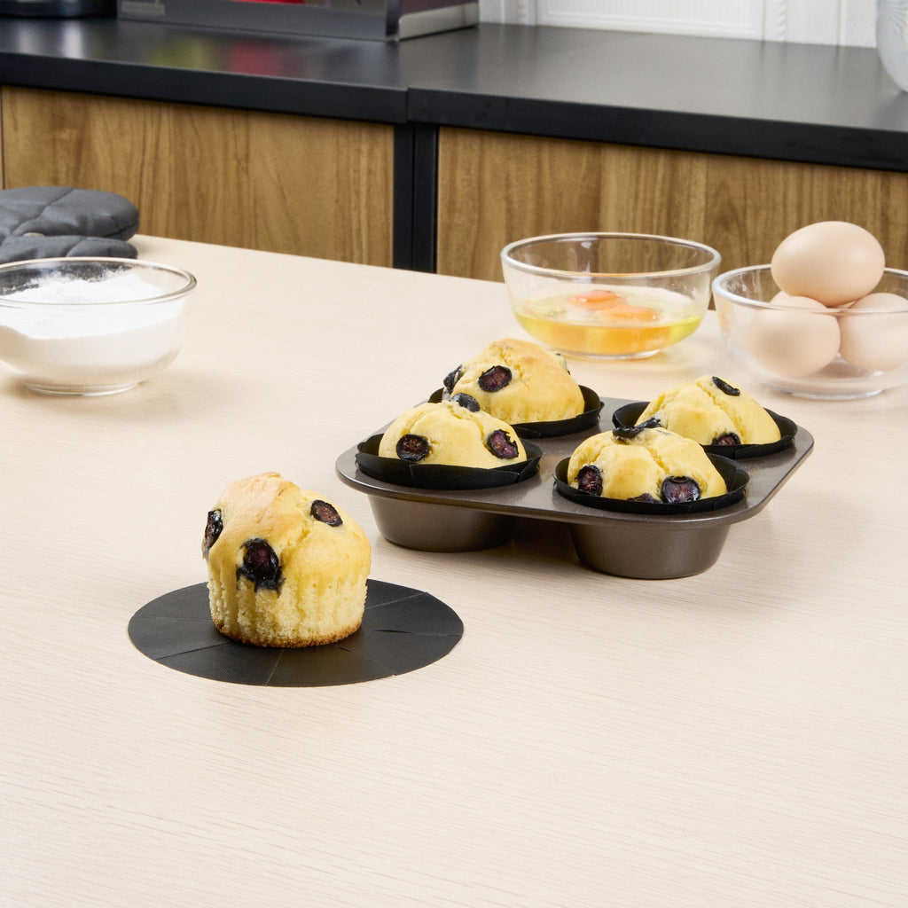 Pastry Tek Round Black Fiberglass Cupcake / Muffin Liner - Non-Stick, Foldable - 2" x 2" - 12 count box
