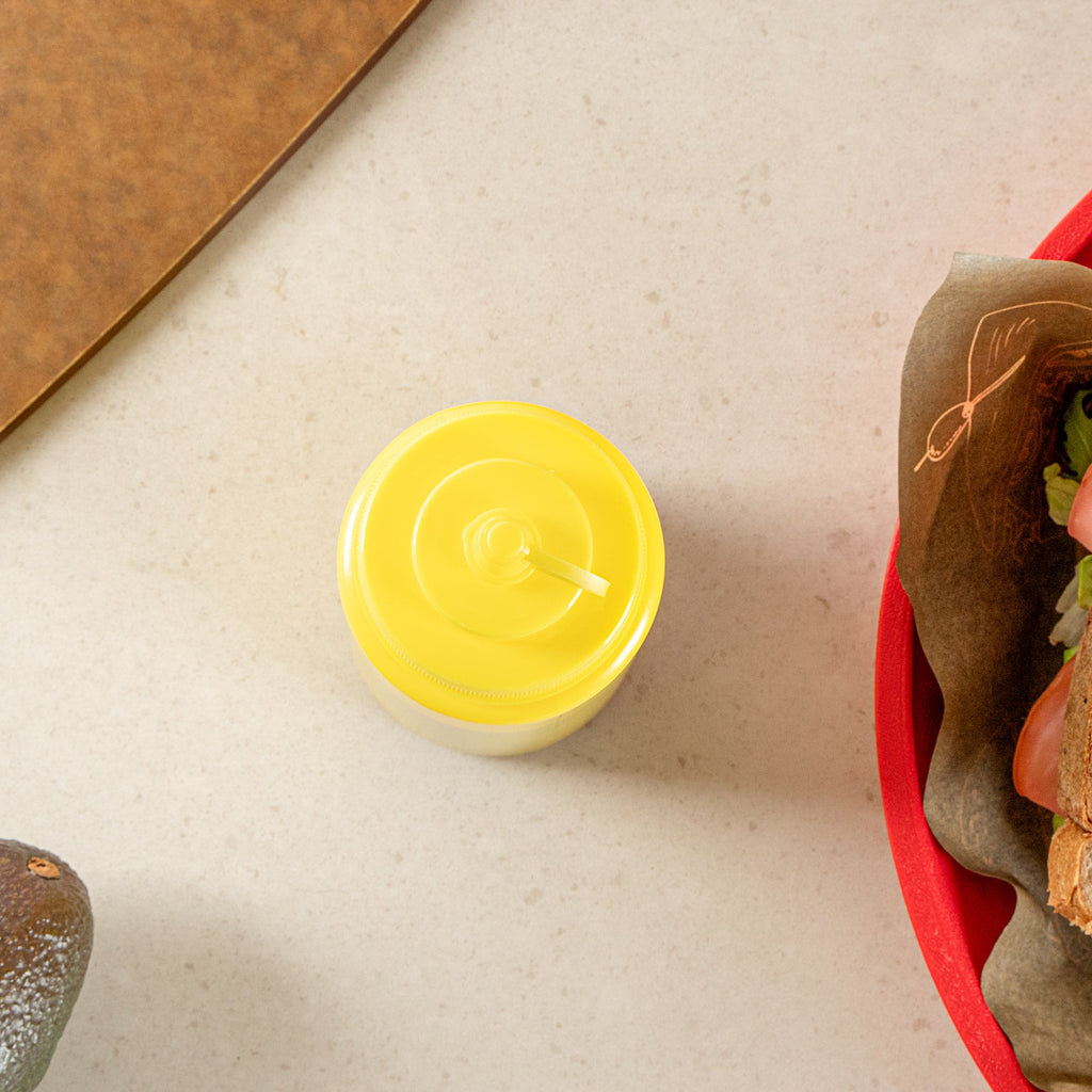 Sauce Tek 16 oz Yellow Plastic Squeeze Bottle - with Cap, Wide Mouth - 2 1/2" x 2 1/2" x 7 3/4" - 1 count box