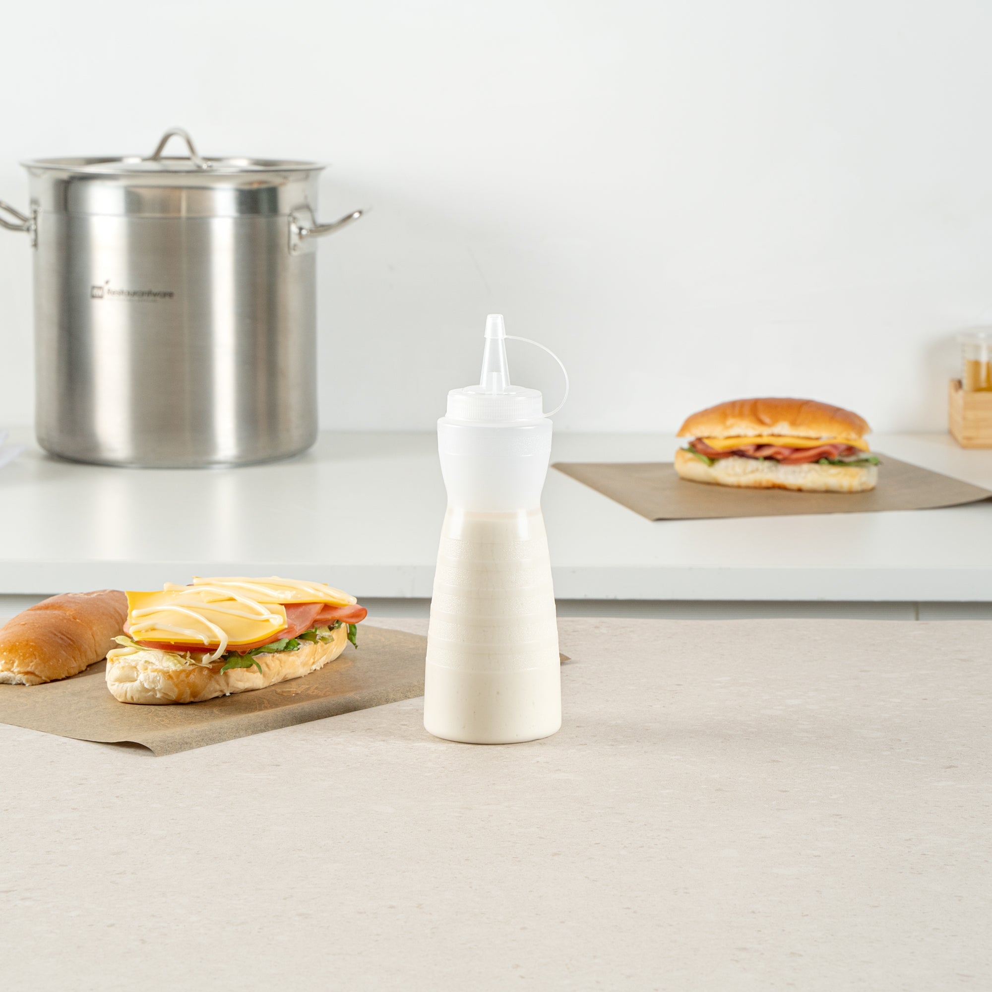 Sauce Tek 12 oz Clear Plastic Squeeze Bottle - with Cap - 2 1/4" x 2 1/4" x 7 3/4" - 1 count box