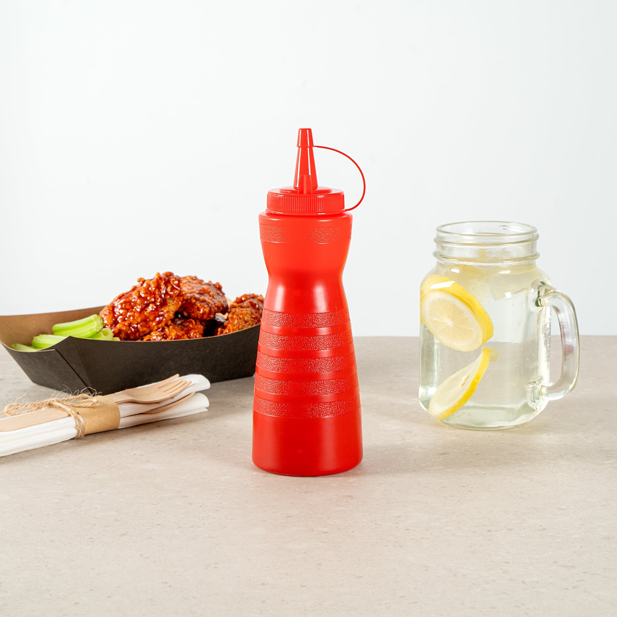 Sauce Tek 12 oz Red Plastic Squeeze Bottle - with Cap - 2 1/4" x 2 1/4" x 7 3/4" - 1 count box