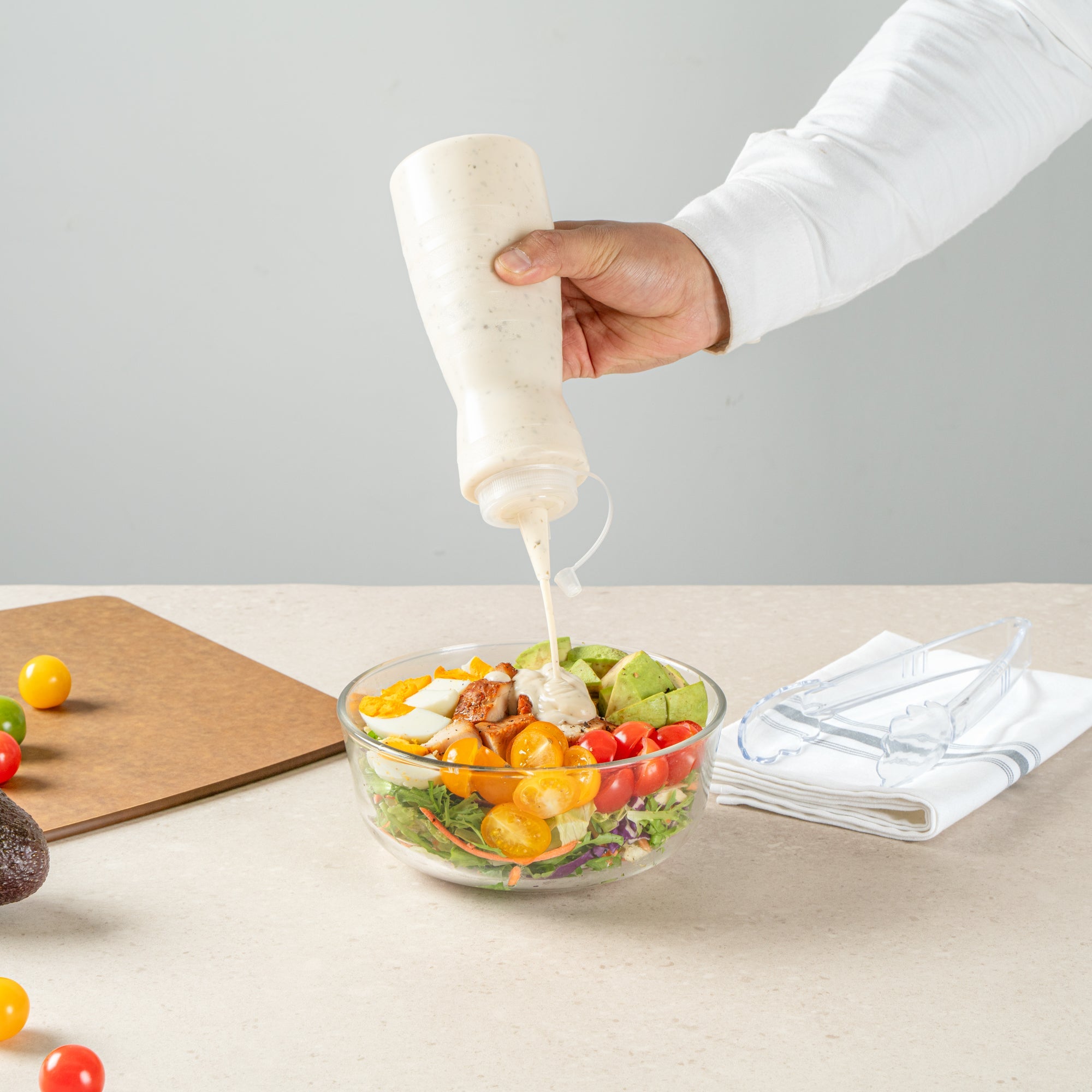 Sauce Tek 16 oz Clear Plastic Squeeze Bottle - with Cap - 2 3/4" x 2 3/4" x 7 3/4" - 1 count box