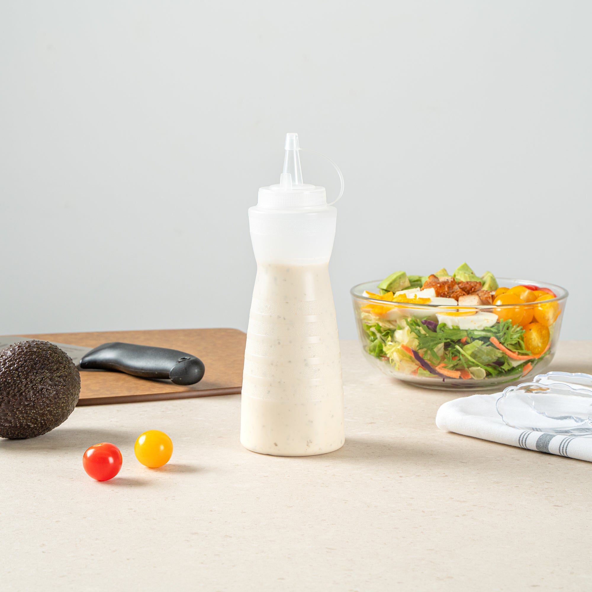 Sauce Tek 16 oz Clear Plastic Squeeze Bottle - with Cap - 2 3/4" x 2 3/4" x 7 3/4" - 1 count box