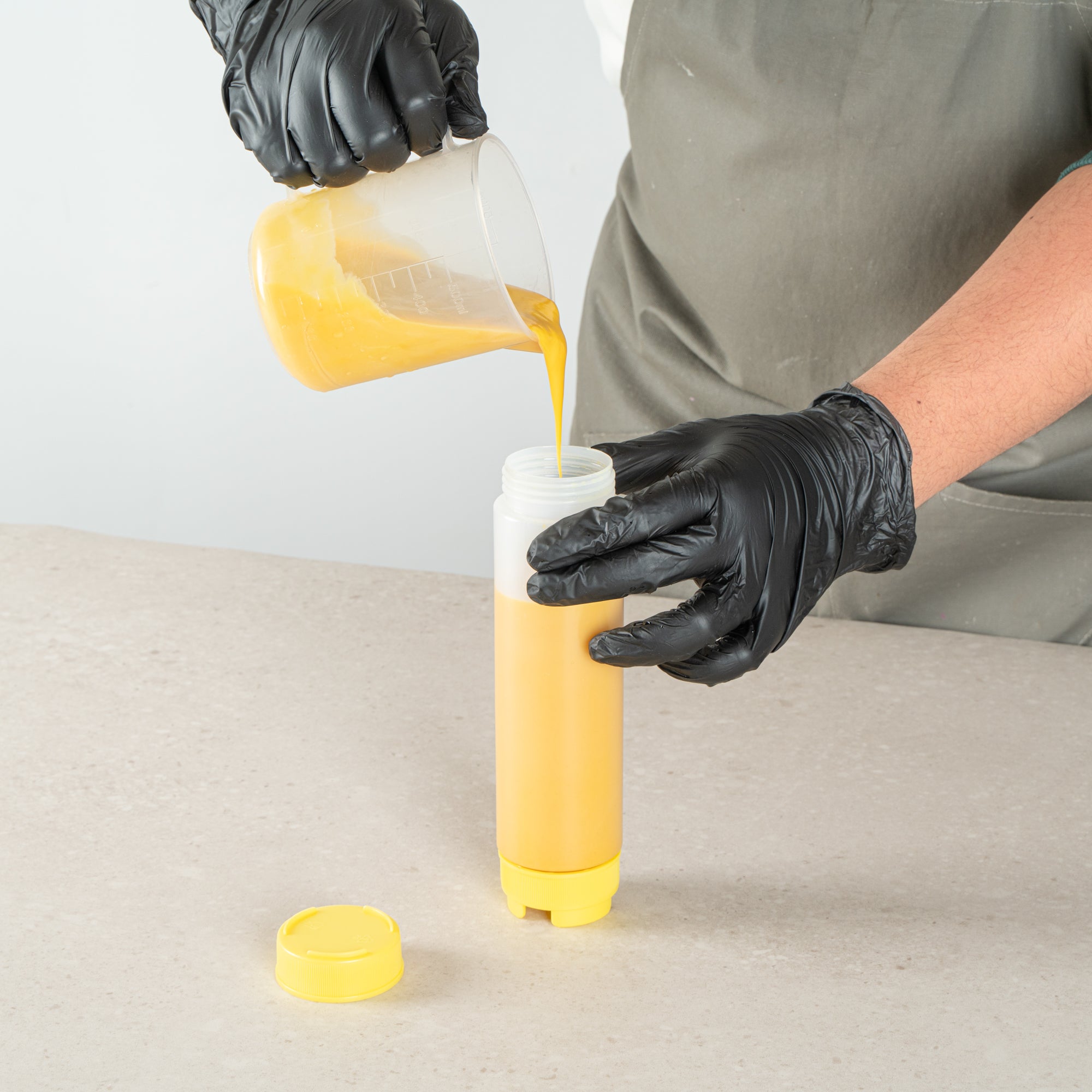 First In First Out 16 oz Round Yellow Plastic Squeeze Bottle - Inverted, Refill & Dispensing Lid - 2 1/4" x 2 1/4" x 8 3/4" - 1 count box