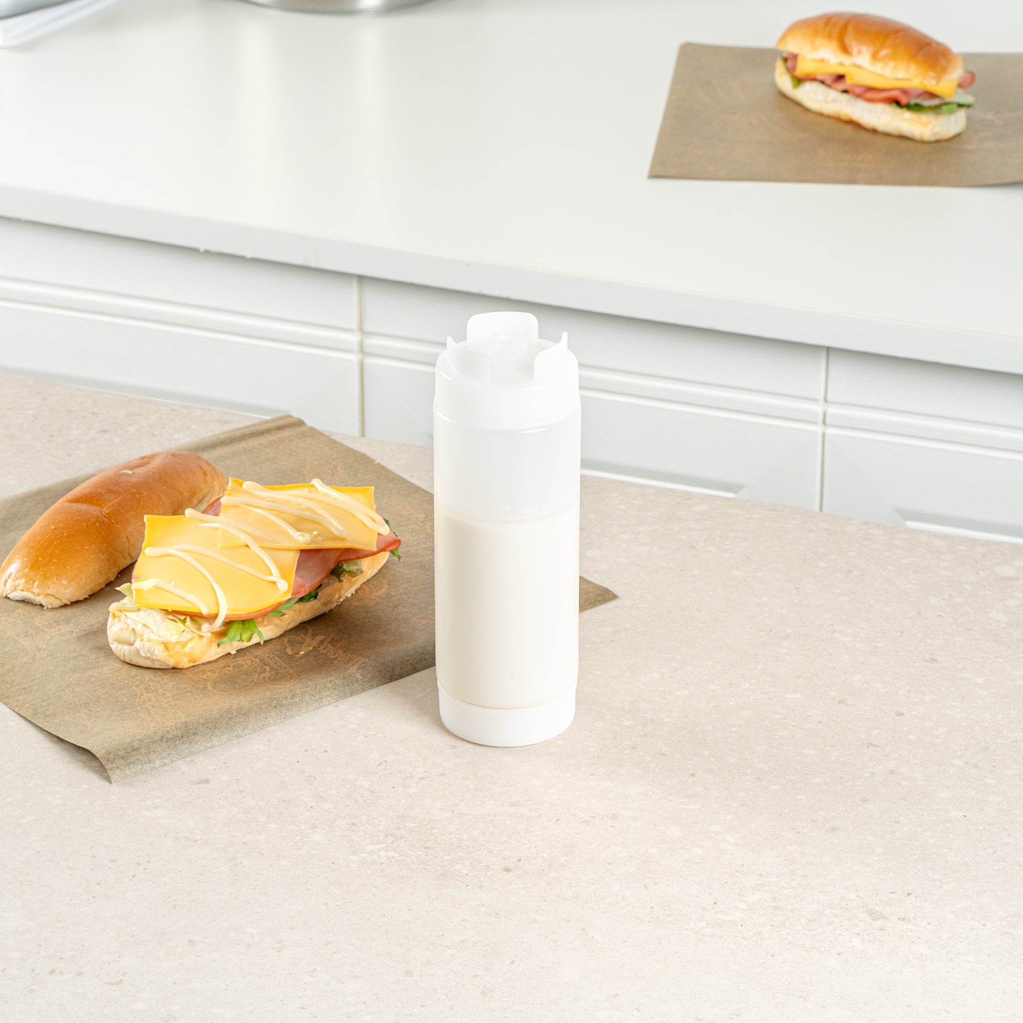 First In First Out 20 oz Clear Plastic Squeeze Bottle - Inverted, Refill & Dispensing Lid - 2 3/4" x 2 3/4" x 7 3/4" - 1 count box