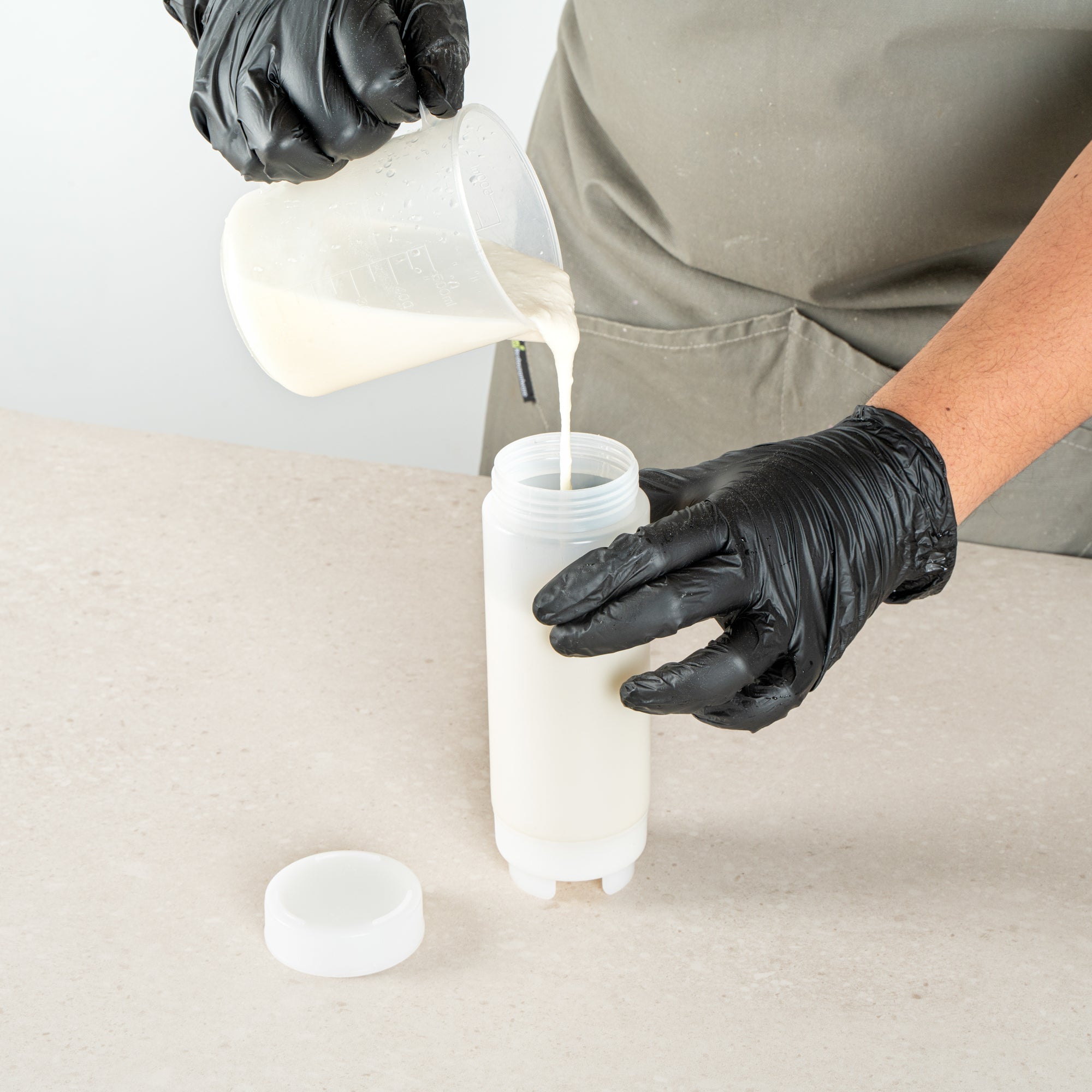 First In First Out 20 oz Clear Plastic Squeeze Bottle - Inverted, Refill & Dispensing Lid - 2 3/4" x 2 3/4" x 7 3/4" - 1 count box