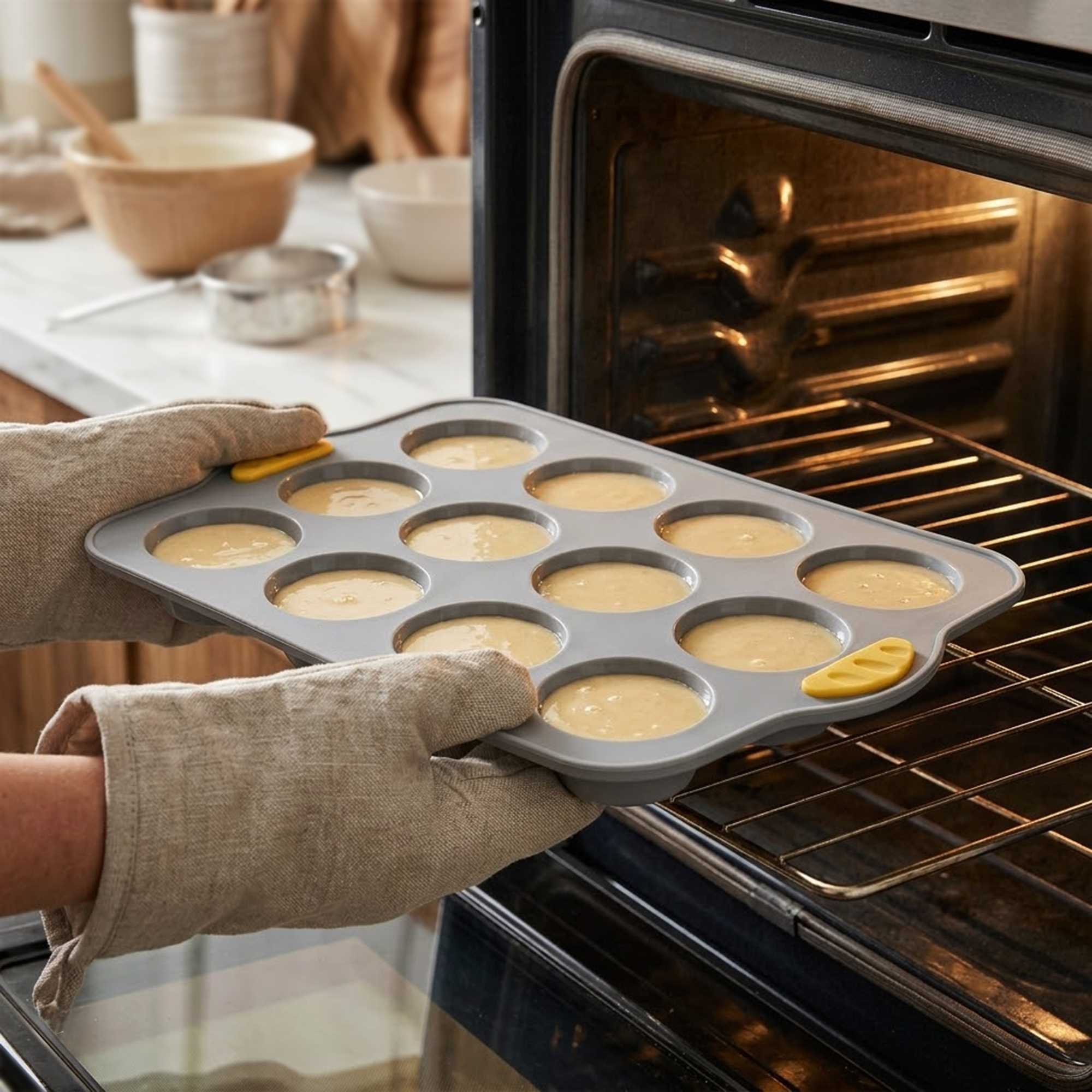 Pastry Tek Gray Silicone Muffin / Cupcake Pan - 12 Compartments, Non-Stick, with Handles - 13" x 9 1/4" x 1 1/4" - 40 count box